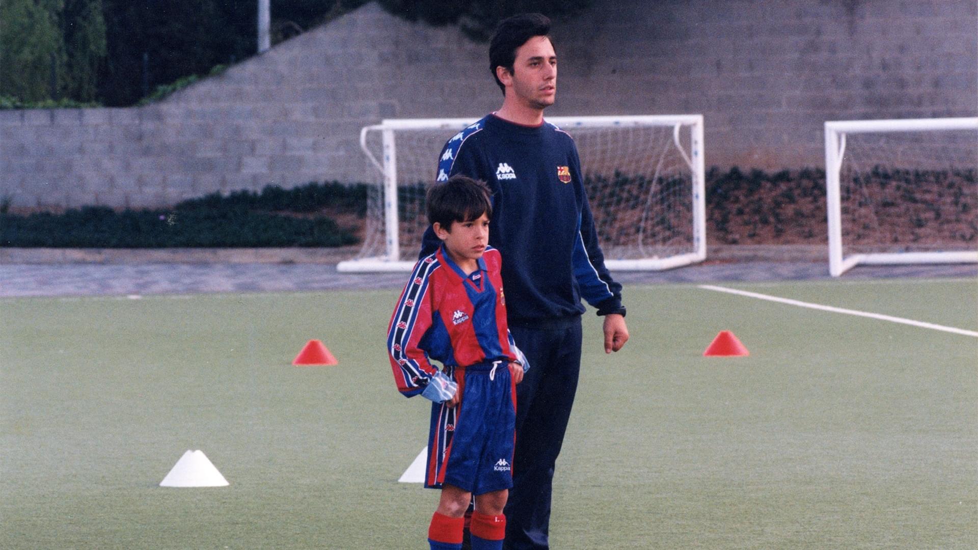Carles Romagosa training Jordi Alba when he was a child.